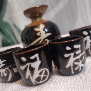 traditional Japanese sake cups (Ochoko) and flask (Tokkuri)